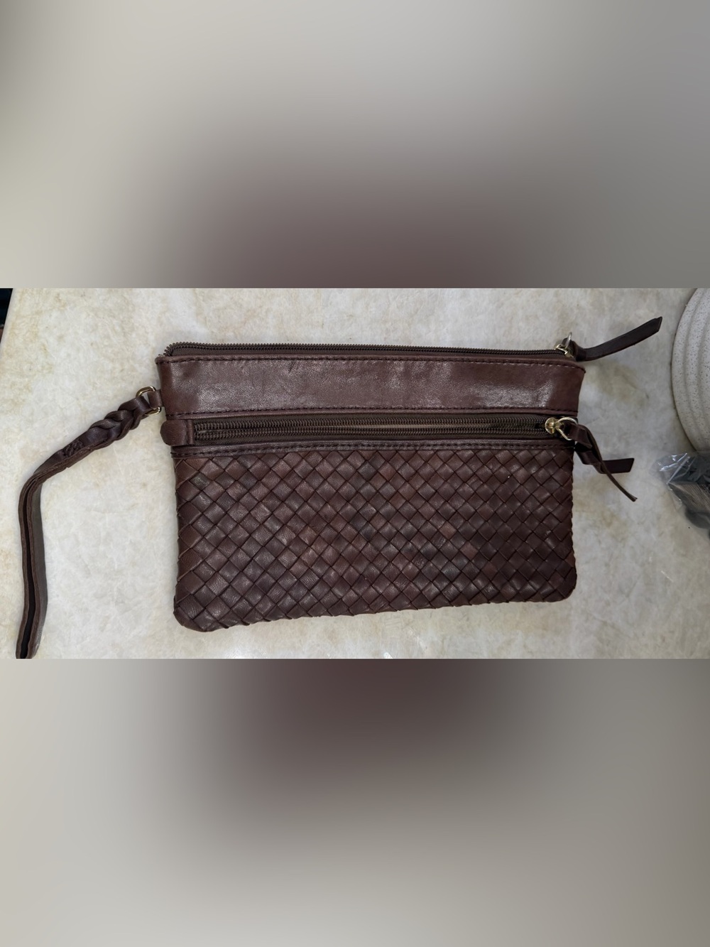 Margot weaved brown leather wristlet clutch
